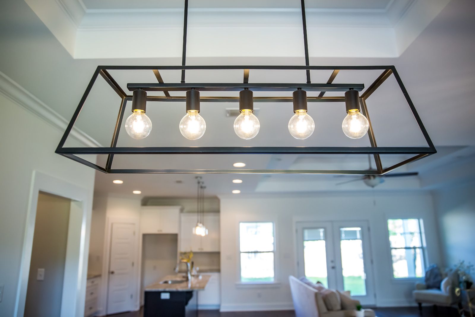 Pendant light fixtures hanging over a counter
